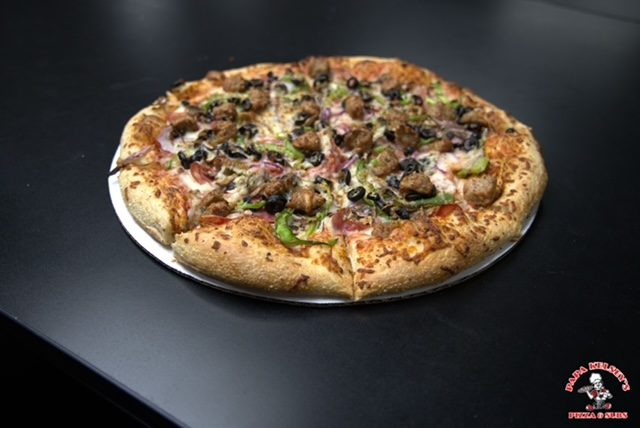 Papa Kelsey's Special pizza with ham, Italian sausage, mushrooms, black olives, green bell peppers and onions