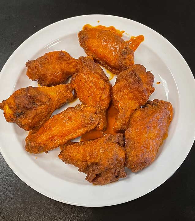 Buffalo wings cooked fresh to order